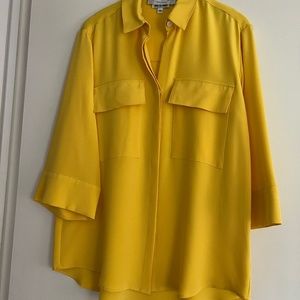 Yellow silk blouse